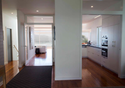 Roseneath Home view of kitchen, living room and stairwell